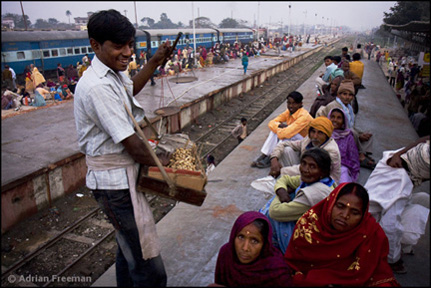 Sitamarhi peanut vendor India train top roof Photograph  Adrian Freeman